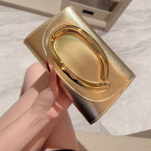 Sophisticated Clutch Gold Accent